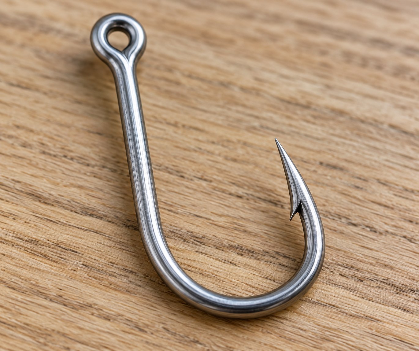 Close-up of a single stainless steel J-hook